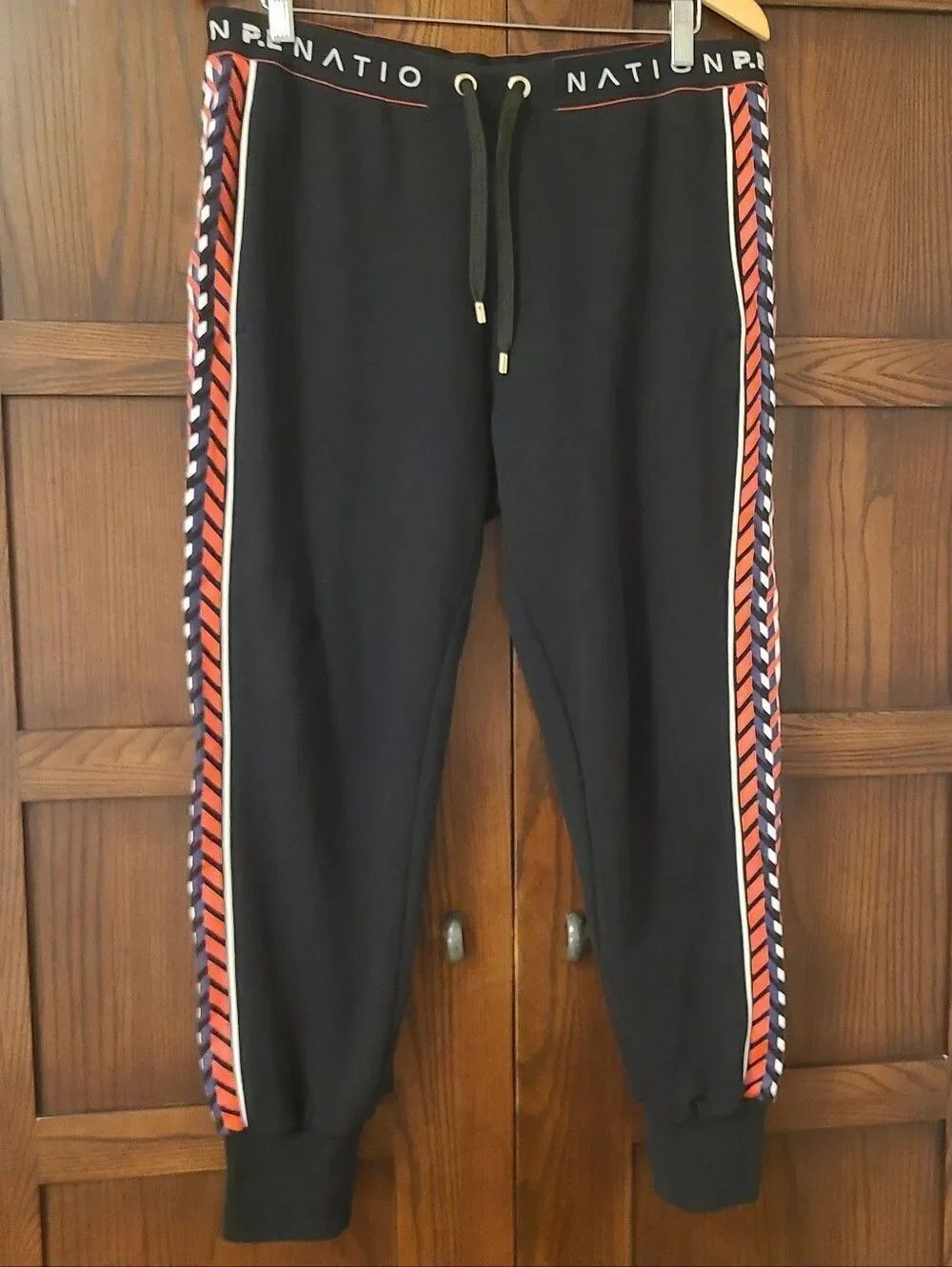 P.E.βNation Black Track Joggers with Red White Blue Graphic Side Stripes Size Me